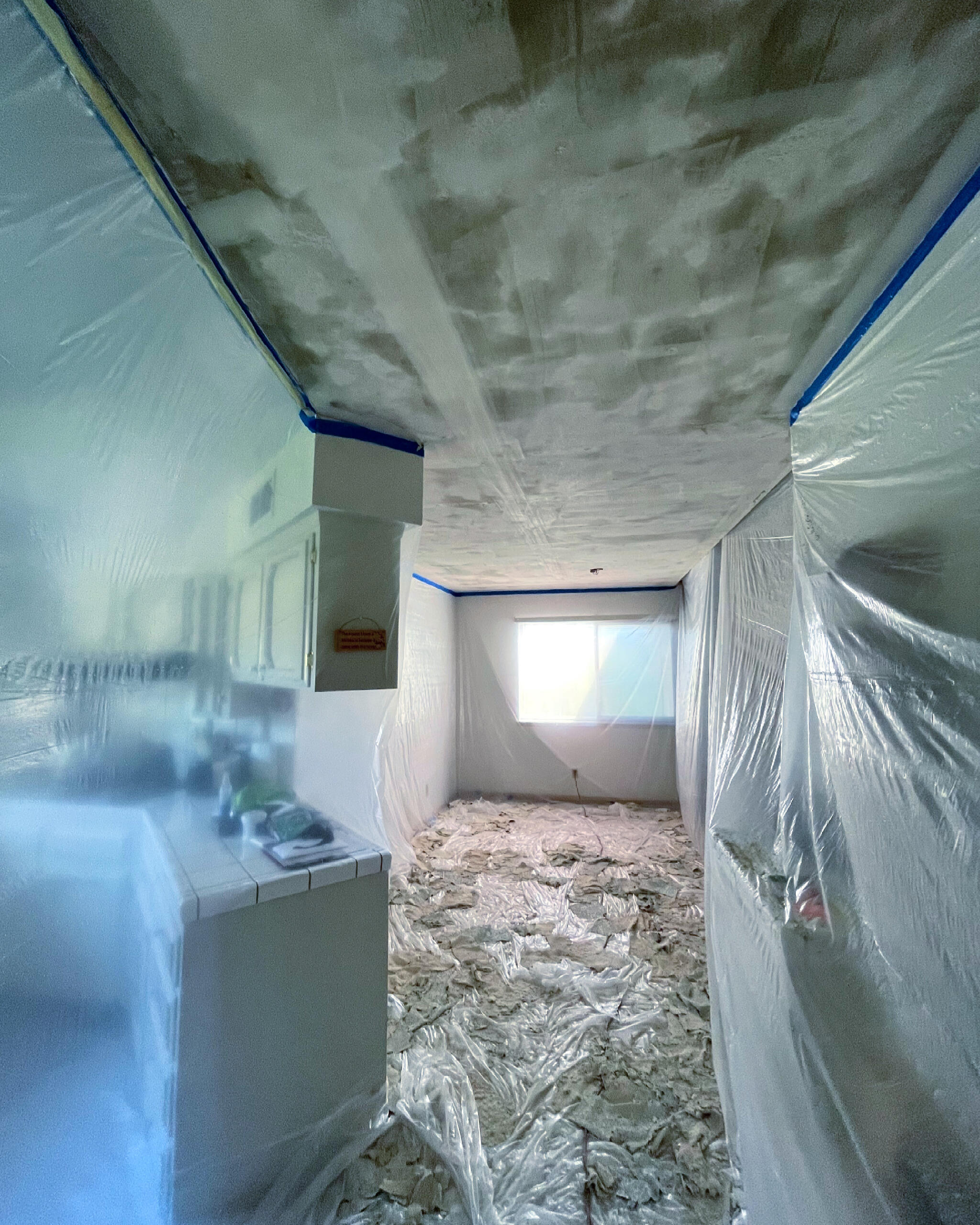 Visalia popcorn ceiling removal in progress